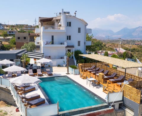 Property building, Patio, Communal lounge/ TV room, Day, Natural landscape, View (from property/room), Balcony/Terrace, Seating area, Mountain view, Pool view, Swimming pool, sunbed