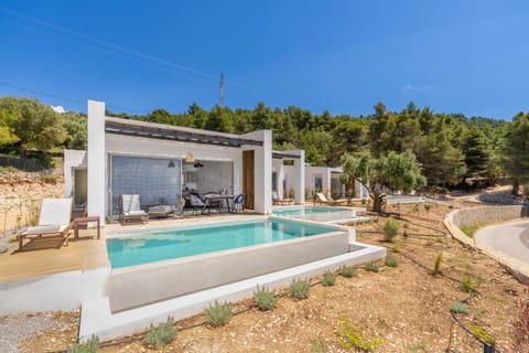 Property building, Day, Natural landscape, Pool view, Swimming pool