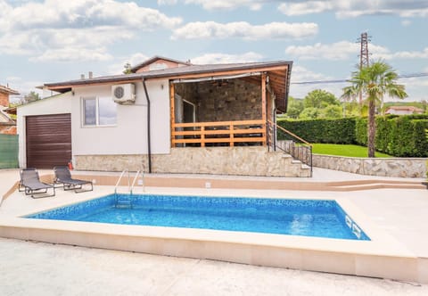 Property building, Patio, Day, Pool view, Swimming pool