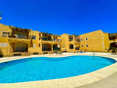 Property building, Pool view, Swimming pool, sunbed