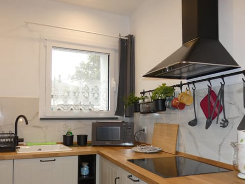 Kitchen or kitchenette, stove