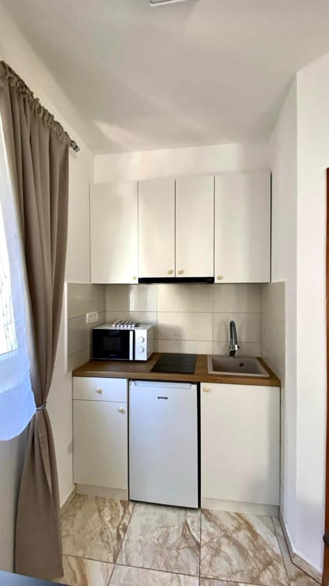 Kitchen or kitchenette, stove