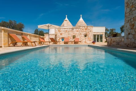 Property building, Living room, Swimming pool