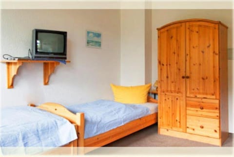 Heckenrose4-EG-mitte Apartment in Norddorf