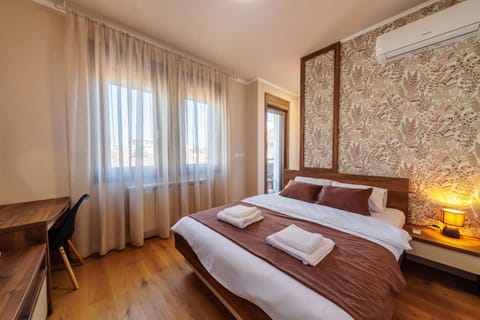 Bed, Photo of the whole room, Bedroom, towels, air conditioner