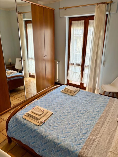 Bed, Photo of the whole room, Bedroom, towels, wardrobe