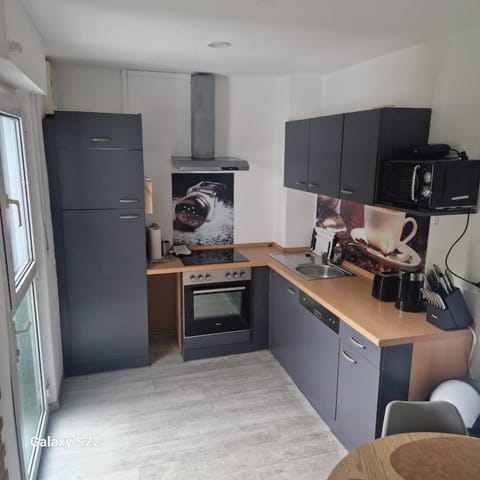 Kitchen or kitchenette, oven, stove, toaster