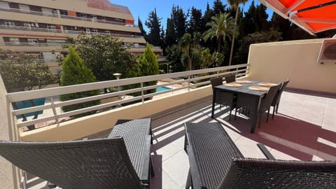 View (from property/room), Balcony/Terrace, Seating area, Pool view, Swimming pool, sunbed