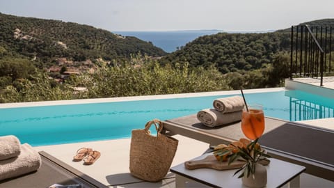 View (from property/room), Balcony/Terrace, Mountain view, Pool view, Sea view, Swimming pool, sunbed