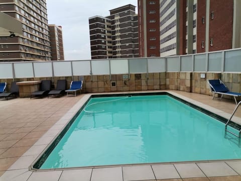 Swimming pool, sunbed