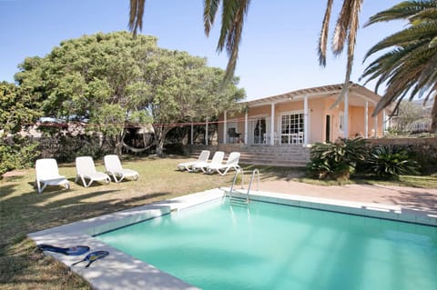 Property building, Living room, Swimming pool