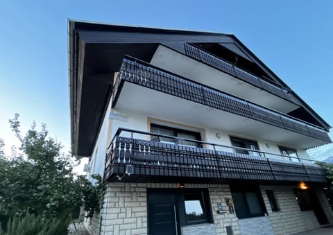 Property building, Patio, Property logo or sign, Balcony/Terrace