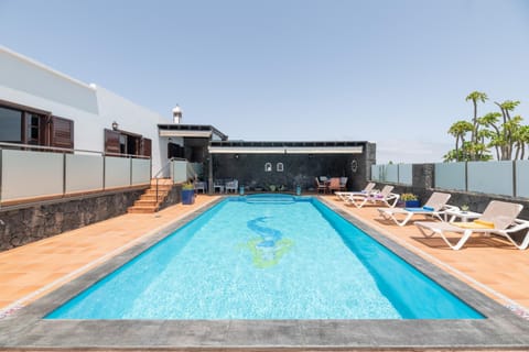 Property building, Living room, Swimming pool