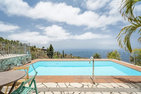 Property building, Living room, Swimming pool