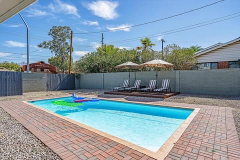 Patio, Day, Pool view, Swimming pool, sunbed