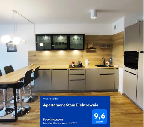 Property logo or sign, Kitchen or kitchenette, Dining area, Logo/Certificate/Sign, Certificate/Award, dishwasher, oven, stove