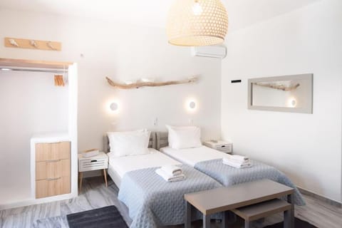 Bed, Photo of the whole room, Bedroom, towels, air conditioner