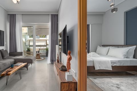 Bed, TV and multimedia, Living room, Photo of the whole room, Seating area, Bedroom