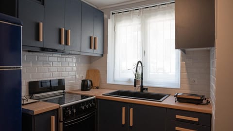 Kitchen or kitchenette, stove