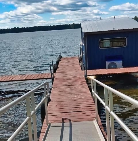 House boat on Fife Lake Docked boat in Fife Lake