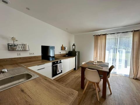 Dining area, dishwasher, oven, toaster