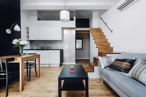 Kitchen or kitchenette, Living room, Seating area, Dining area