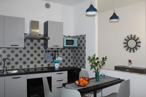 Kitchen or kitchenette, oven, stove, toaster
