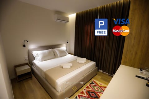 Bed, Bedroom, towels, air conditioner