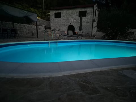 Property building, Seating area, Swimming pool