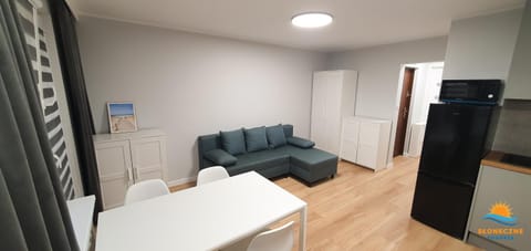Kitchen or kitchenette, Living room, Seating area, microwave, oven, wardrobe
