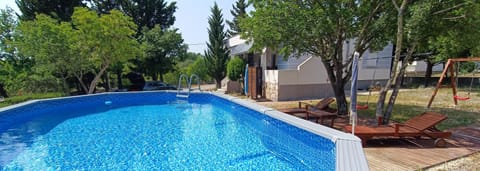 Property building, Garden, Pool view, Swimming pool
