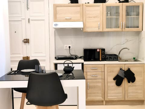 Kitchen or kitchenette, stove