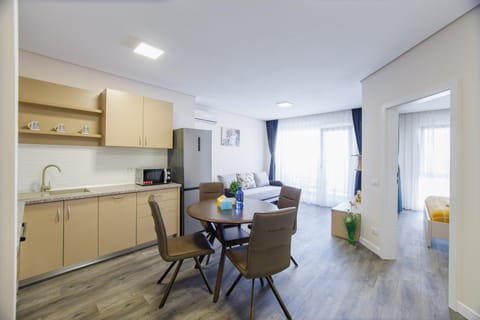 Kitchen or kitchenette, Living room, Seating area, Dining area, dishwasher, stove