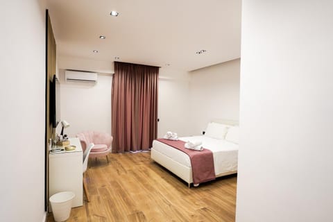 Bed, Photo of the whole room, Bedroom, towels, air conditioner