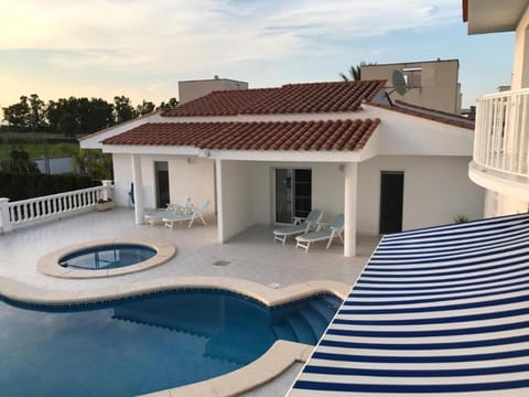 Property building, Patio, Day, View (from property/room), Balcony/Terrace, Balcony/Terrace, Pool view, Swimming pool, Swimming pool