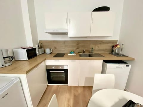 Kitchen or kitchenette, oven, stove, toaster