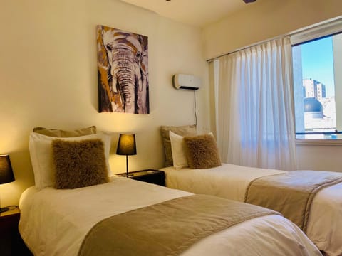 Bed, furniture, towels
