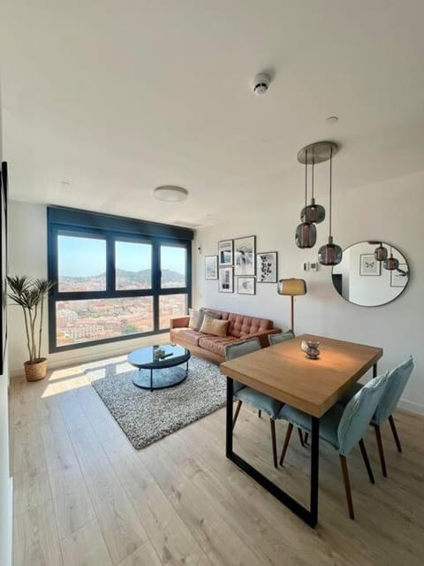 TV and multimedia, Living room, Photo of the whole room, Seating area, Dining area, City view, Mountain view, air conditioner