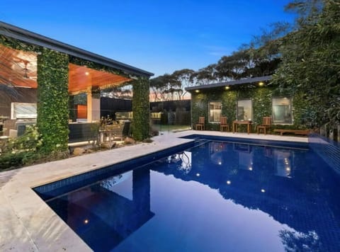 Property building, Patio, Pool view, Swimming pool, sunbed
