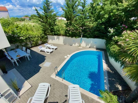 Natural landscape, Garden, Pool view, Swimming pool, Entertainment, sunbed
