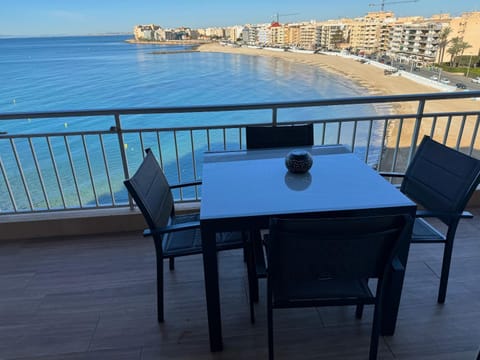 View (from property/room), Balcony/Terrace, Seating area, Beach, City view, Sea view