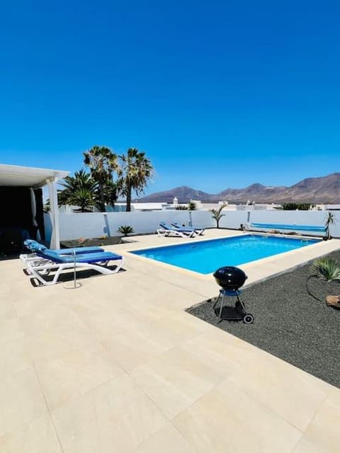 Patio, Natural landscape, BBQ facilities, Mountain view, Pool view, Swimming pool, sunbed