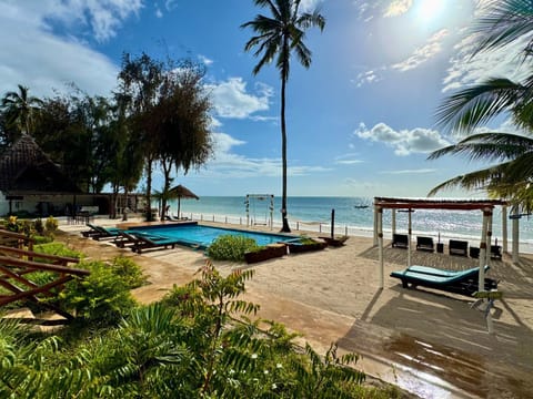 Day, Natural landscape, Garden, Beach, Garden view, Pool view, Sea view, Swimming pool, sunbed