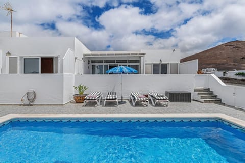 Property building, Living room, Swimming pool