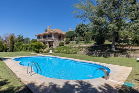 Property building, Living room, Swimming pool
