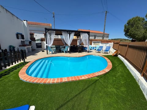 Property building, Living room, Swimming pool