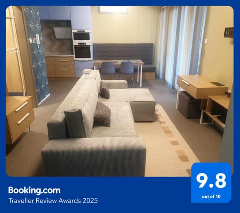 Communal lounge/ TV room, People, People, People, TV and multimedia, Coffee/tea facilities, Kitchen or kitchenette, Living room, Other, Other, Other, Photo of the whole room, Seating area, Dining area, On site, City view, City view, Area and facilities, Area and facilities, Area and facilities, Meals, Meals, children, children, children, young children, young children, young children, older children, older children, older children, Family, Family, Family, flat iron, furniture, furniture, furniture, heating, heating, internet, internet, internet, microwave, oven, soundproof, stove, stove, trouser press, trouser press, wardrobe, elevator, air conditioner, air conditioner