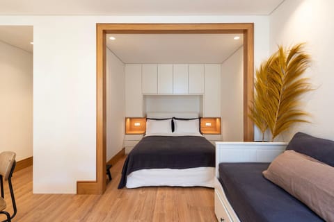 Bed, Living room, Seating area, Bedroom