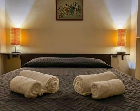 Bed, Bedroom, towels, air conditioner