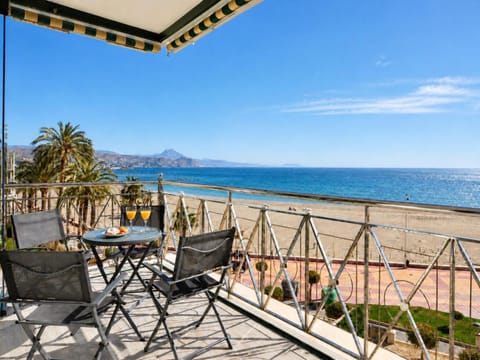 View (from property/room), Balcony/Terrace, Seating area, Dining area, Beach, Mountain view, Sea view